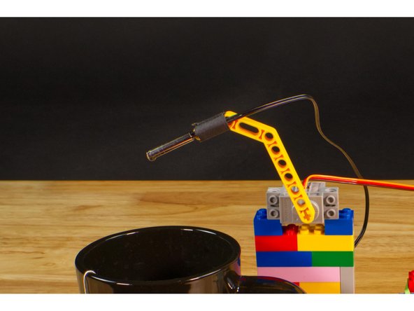 Our thermistor is attached to the Technic Beam using... tape! Yes, tape and rubber bands are always good to have on hand for making anything LEGO compatible!