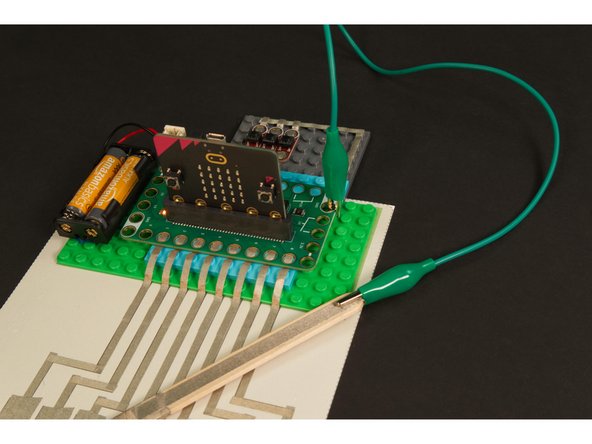 If you're right handed you may prefer to connect it to the right side rear ground pin, and if you're left handed you may want to use the left side front ground pin.