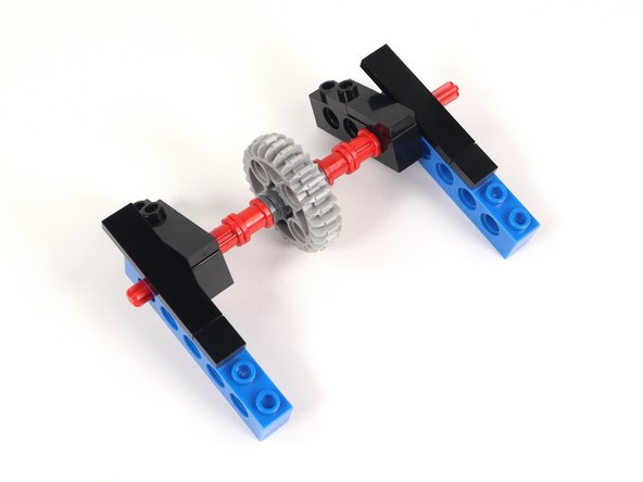 Since the bricks with holes can swing around the axle, pay attention to photo three to assure your build is accurate.