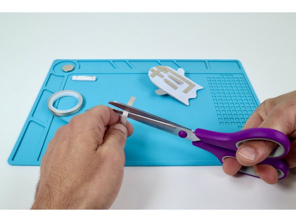 Cut and peel a small piece of Maker Tape.