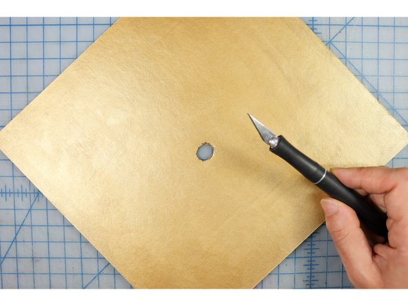 If you plan to paint the base of the robot costume, do so before proceeding.