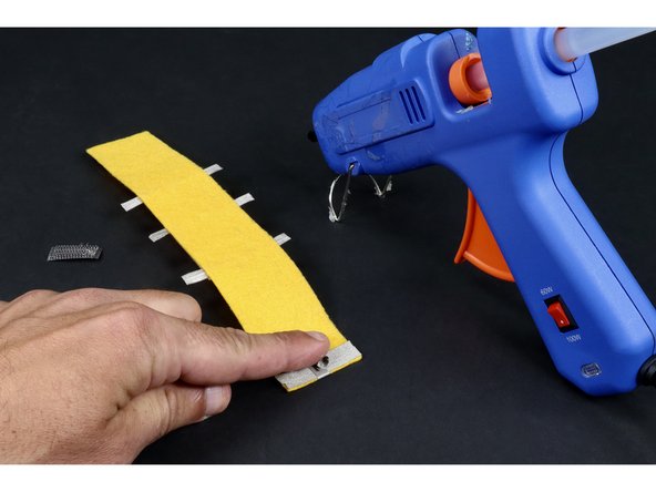 Repeat the previous step to make and place another tape loop on the remaining &quot;pad&quot;.   