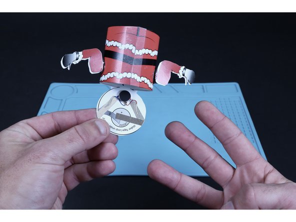 Peel and stick the three Maker Tape paths shown in photo 2.