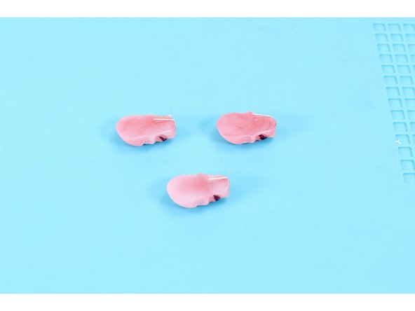 Optional: Use a fine tipped black permanent marker to color in the recessed details!