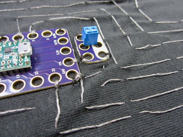 Connect the Positive to the 5V (VIN) pin on the Invention Board, and the Negative side to the Ground pin on the Invention Board.