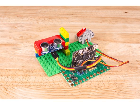 A few Technic pins, a Technic beam, and some LEGO bricks are all that is needed.