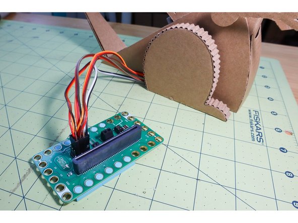 Connect the LED to - (negative) and Pin 1. (Remember, the shorter leg of the LED is negative and the longer leg is positive.)
