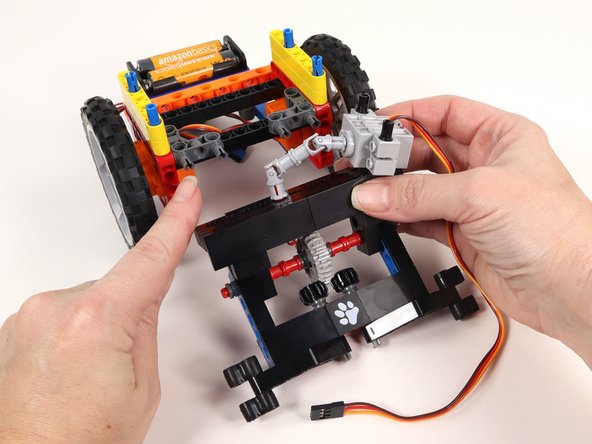Connect the Claw to the front of the Rover to the gray 90° connectors by pressing it into place on the exposed pins.