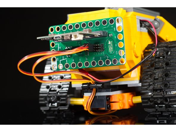 WALL-E is awesome, but if you don't have one you can use this same circuit featuring two 360 degree continuous rotation servos in other robots.