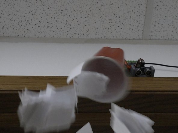 Place the circuit above a doorway, hidden on the side where a person won't see it when walking into the room.