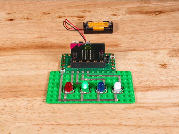 Connect the Positive (+) side of the first LED to Pin 1 on the Bit Board.