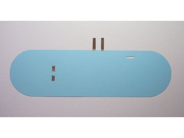 Fold the extra on itself to create two small tabs