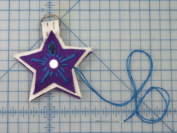 Tip: Embroider the top star before connecting it to the project for easy stitching.