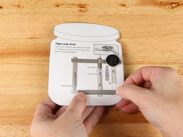 Add Maker Tape to tape path E.  over the top of the LED leg.