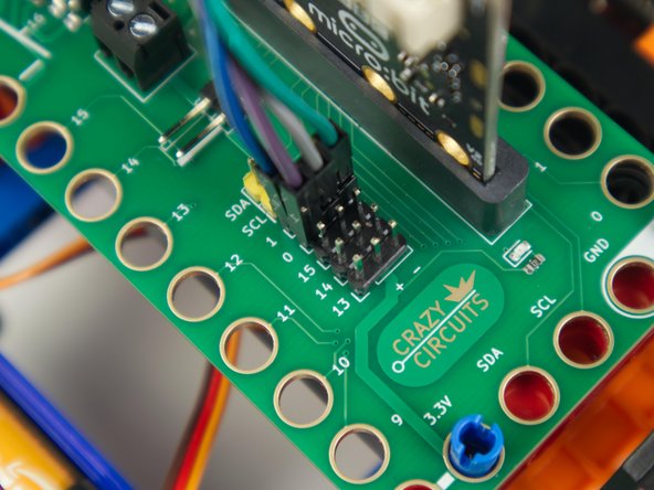 Wire colors in the photo may not match wire colors in the diagram. The important part is to plug each pin into the correct position.