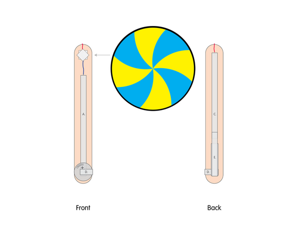 Add another square of double sided tape onto the shaft of the motor, and then stick the lollipop to it.