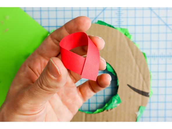 I used a strip of paper as a hanger.