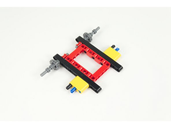 Note the orientation of the connectors in the photo. Make sure you leave two holes accessible at the end of the beam.