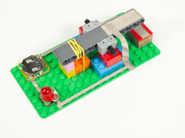 The final connection! We just need to add some 1/8&quot; Maker Tape to connect the Negative side of the LED to the 1/4&quot; Maker Tape we added in the previous step.