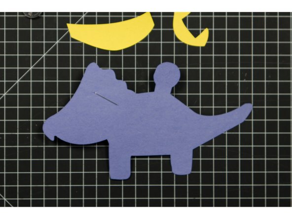 Run a piece of tape covering the positive LED leg, down and then over to the round battery holder piece.