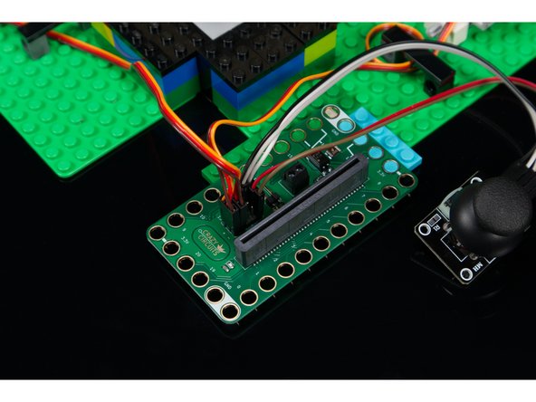Using Jumper Wires start by plugging the Thumbstick VRY Pin into Pin 1 on the Bit Board.