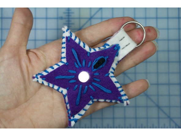 Tip: To do a whip stitch, insert your needle through the same side of the felt for each stitch, and allow the thread to wrap over the edge.