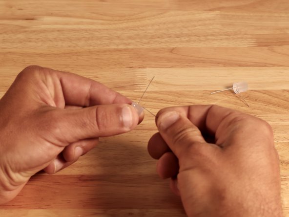 Locate the short LED legs and bend them outward as pictured.