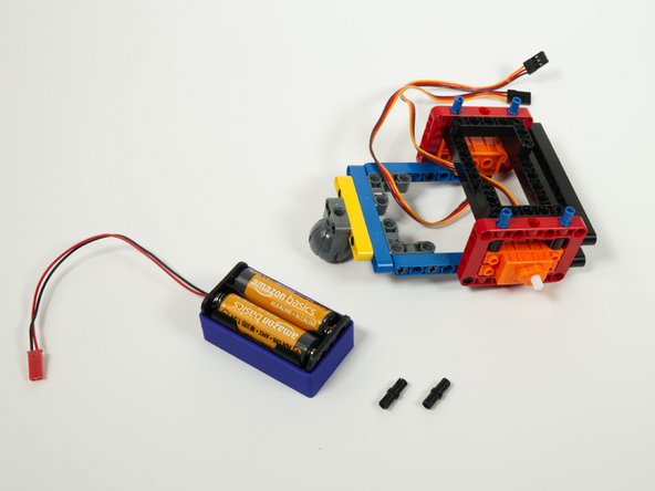 Next up we'll add the blue two AA battery holder.