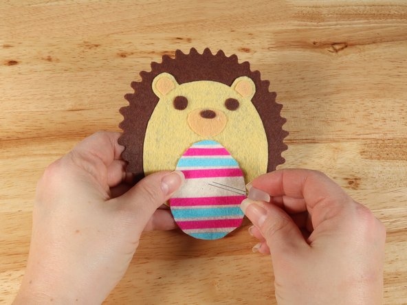 Add the LED by pushing the legs through the holes.