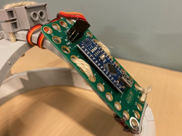 Attach the Crazy Circuits board to the back of the structure using twine.