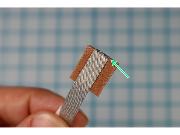 Start by placing Maker Tape on one side of the foam, then wrap it over the edge to the other side so that there is Maker Tape on both sides of the piece.