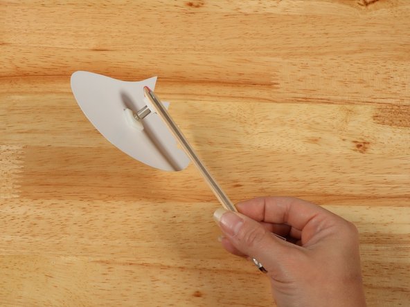 If you're using hot glue instead of double sided tape make sure to be careful when applying it so you don't glue the shaft to the motor housing. It needs to spin freely!