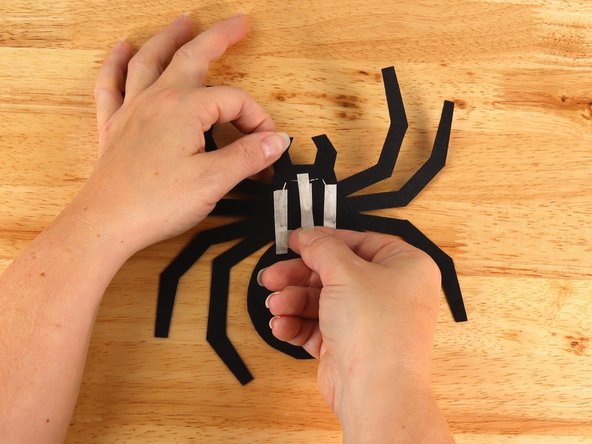 Two layers of Maker Tape create a &quot;tape sandwich&quot; with the LED legs in the middle. Since the felt isn't as flat as paper this will help create a better electrical connection.