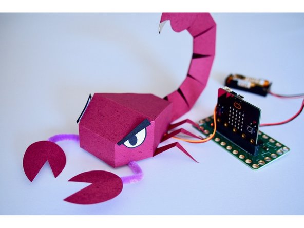 I initially tried this with capacitive sensing (which doesn't require touching the GND pin), but found that the piece of Maker Tape I used was so long, that the capacitance of the tape itself affected the touch sensor!