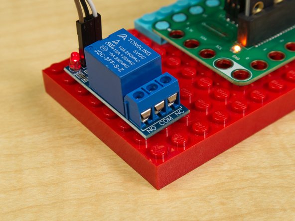 Note: Version 2.1 of the Bit Board does not have an on-board relay. You can use an external relay module in its place.