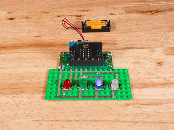 Connect the Positive (+) side of the first LED to Pin 1 on the Bit Board.