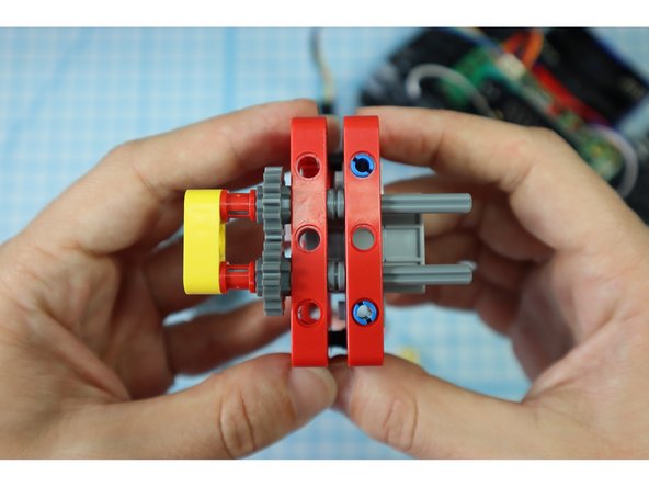 Note: The black pins won't be fully inserted into the red frame, they are just there for some extra stability. 