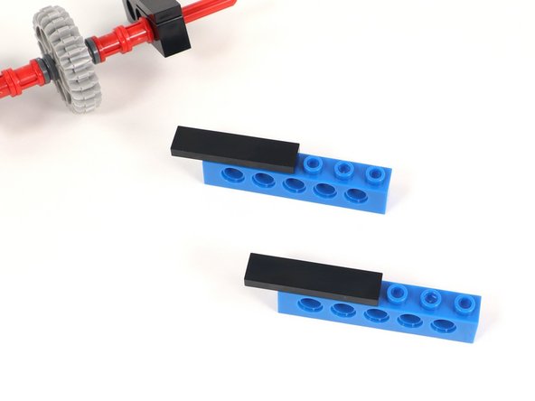 One stud of the the tile will stick off the end of the brick. You should have three studs still exposed.