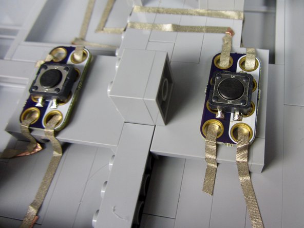 Connect the colored side of the A button to Pin 1.