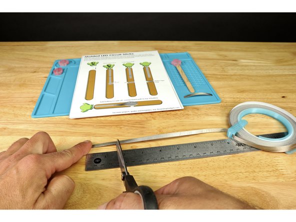 Cut two pieces of Maker Tape: 1 that is 2.5&quot; long and another that is 1.5&quot; long.