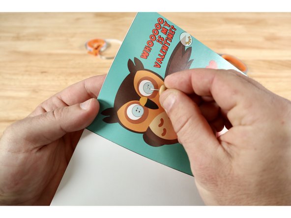 Use a push pin to poke two small holes where indicated within each of the graphics for LEDs. There will be four holes total.