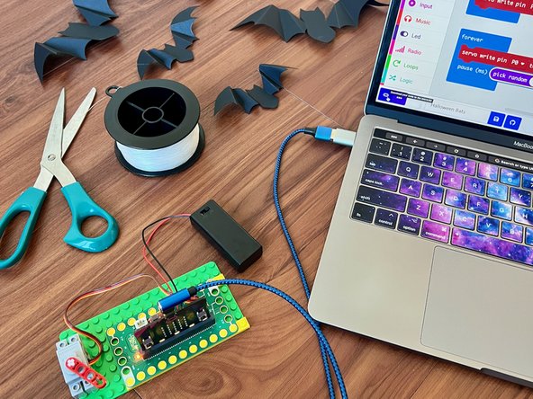 Upload the code to micro:bit : https://makecode.microbit.org/_X8LWao0mb...