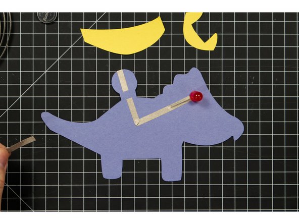 You can choose to make a right angle turn or overlap multiple pieces of tape. Either method will work with Make Tape because it's conductive on all sides.