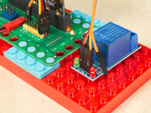 Connect the IN from the Relay Module to Pin 13.