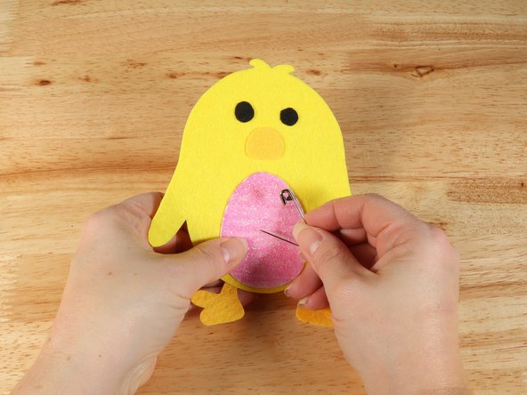 Use a safety pin or a push pin to poke two holes through the felt for the LED legs to go through.