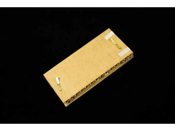 With your switch assembled we're going to add two more pieces of Maker Tape to make it a bit easier to use our switch in a circuit.