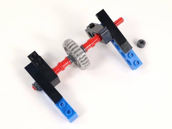 The bricks may spin around the axle at this point. Do not worry about that since we will address it when we connect Section 1 and Section 2.