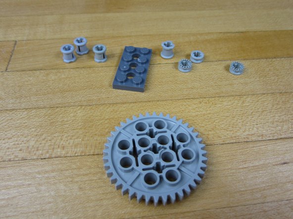 You'll need 4 x Bushings, 3 x 1/2 Bushings, 1 x 2x4 Plate with holes, 1 x Large Gear.