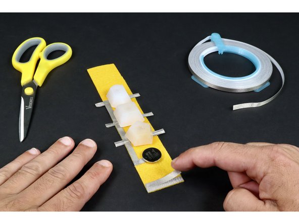 Peel and stick  these two pieces where shown so that they overlap a little bit.