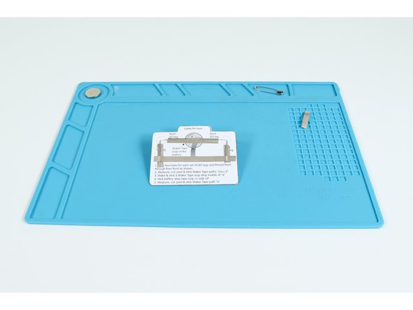 Make and stick a Maker Tape loop atop path "a" where shown on your circuit diagram.